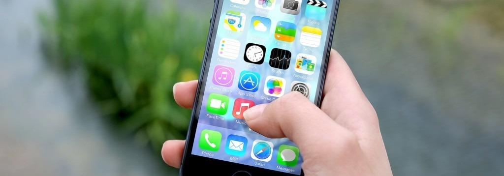 apple iphone with onscreen apps