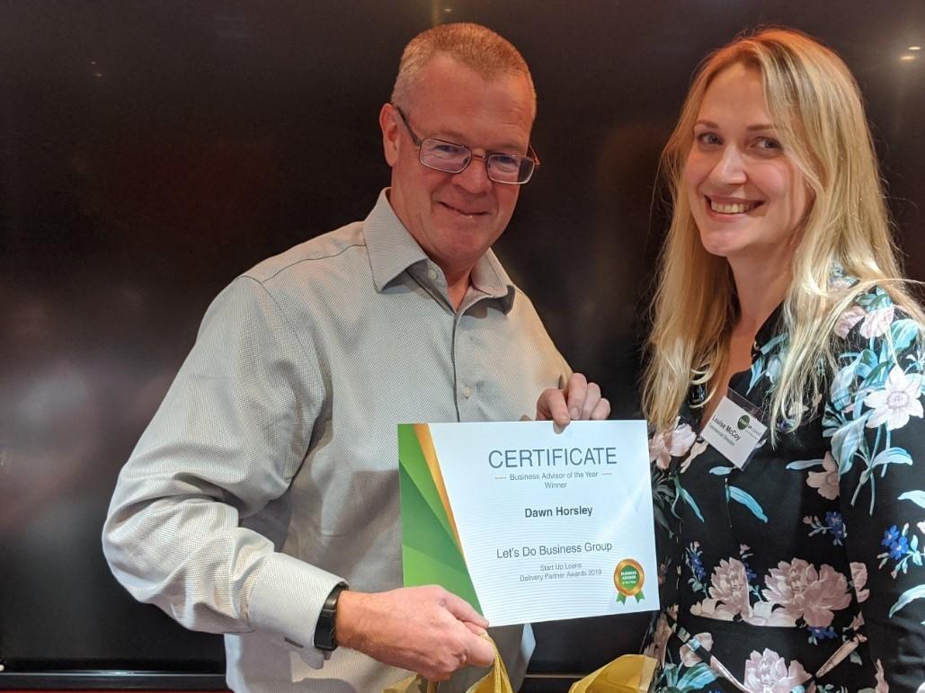 Louise McCoy presenting a certificate to Dawn Horsley