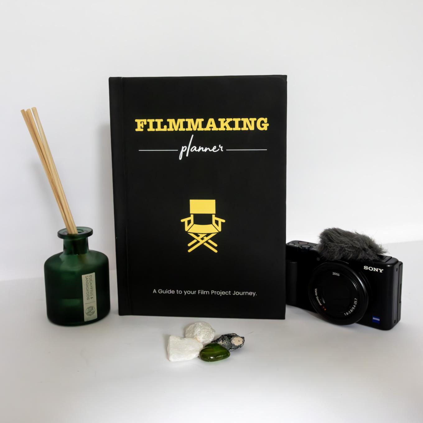 planner notebook and camera