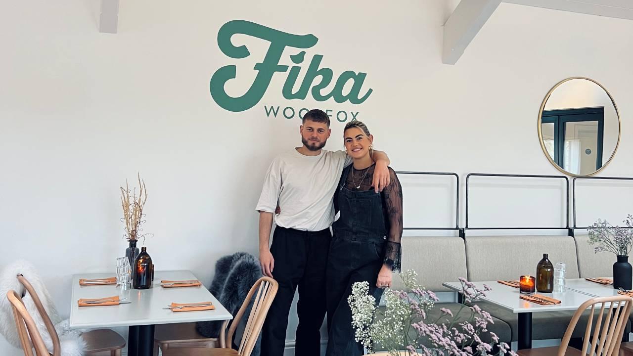 owners of fika cafe standing 