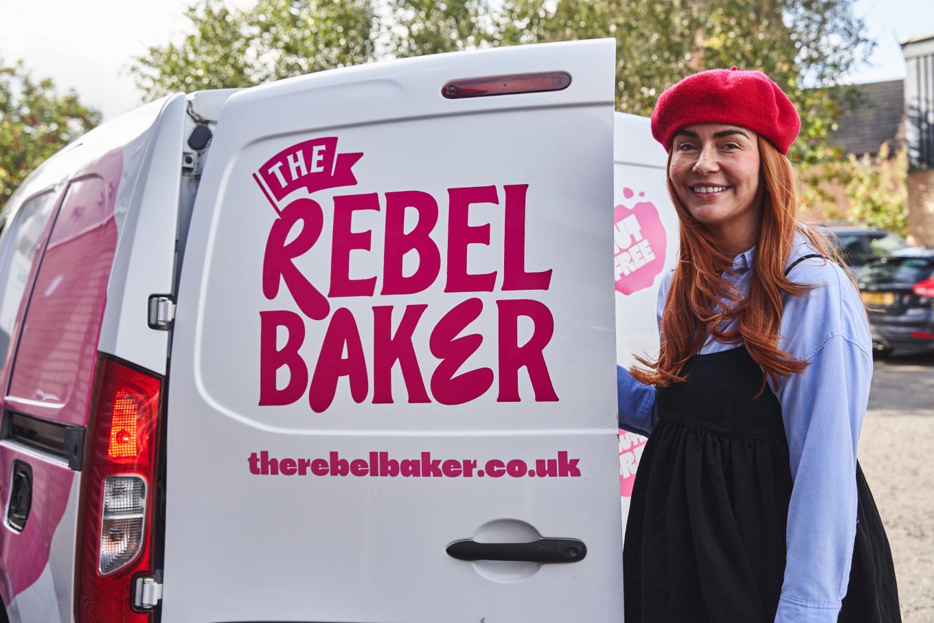 Founder of The Rebel Baker with a branded van